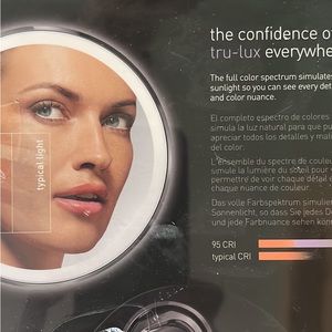 Simple human compact black stainless steel magnifying mirror. New in box.